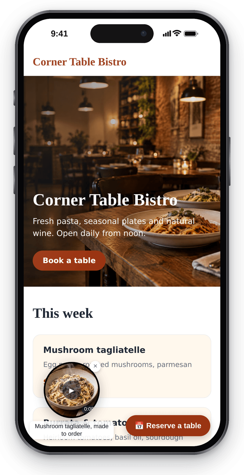 A bistro website on a phone with a video bubble in the corner: a mushroom tagliatelle clip with a caption below